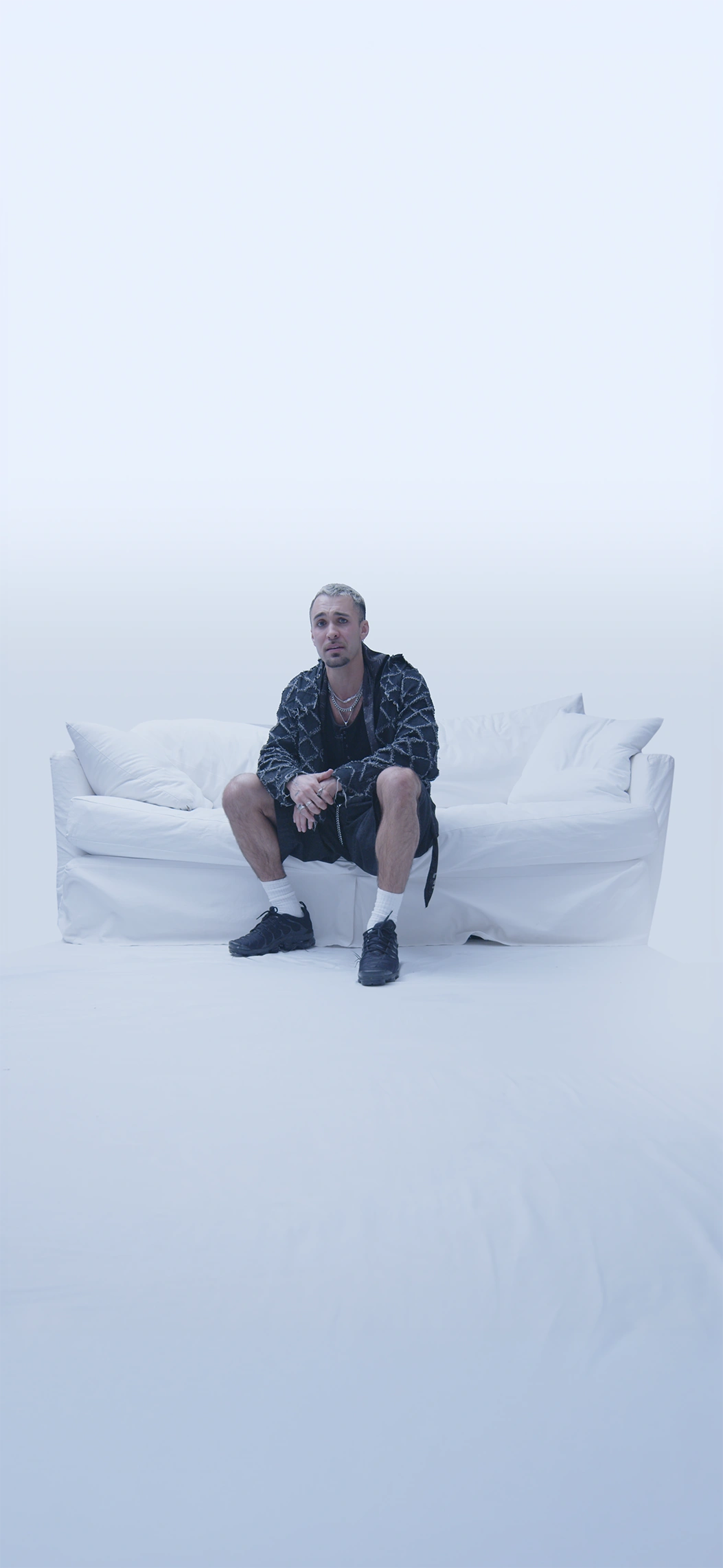 Cinematic Films — Jahn seated on couch